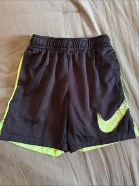 Nike Womens Black Shorts with Neon Yellow Swoosh